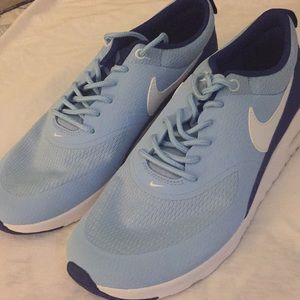 Light blue and white comfortable tennis shoes